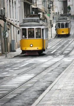 Two old yellow trams Stock Photos