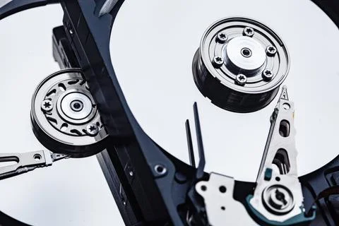 Two open computer hard drives for repair. Data safety concept. Stock Photos