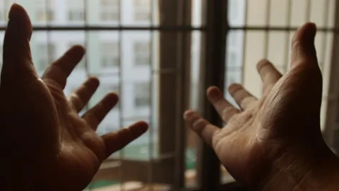 Two open hands palms facing up raised toward Video stock 337042307