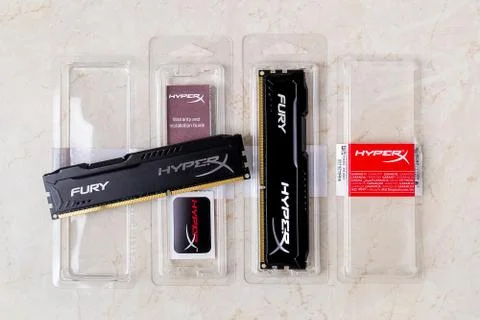 Two opened boxes with RAM Kingston Fury memory modules, sticker and warranty. Stock Photos