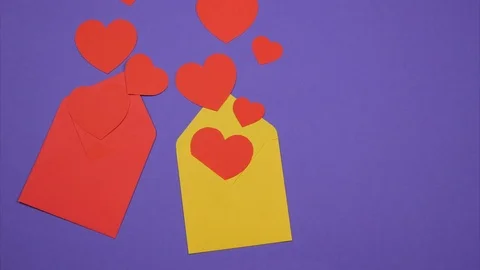 Two opened envelopes and red hearts flying out. Stock Footage 102797803