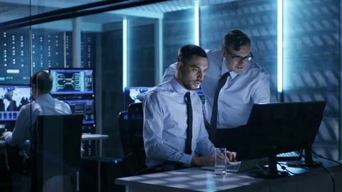Two Operation Engineers Working on Solving Problems in System Control Room. Stock Footage 74926446