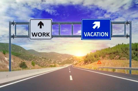 Two options Work and Vacation on road signs on highway Stock Photos