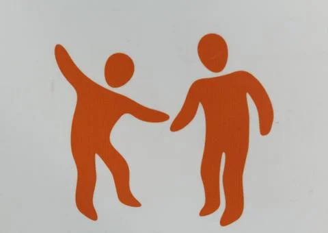 Two Orange Figures Dancing Together Stock Illustration