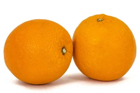 Two orange fruit, isolated on white background Stock-Fotos