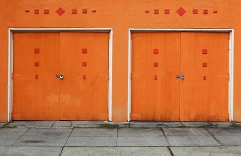 Two orange garage doors Stock Photos
