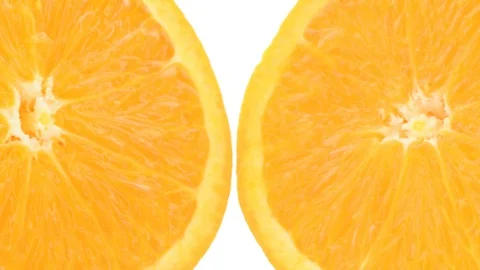 Two orange halves - extreme closeup pan with extreme detail Stock Footage 104838570