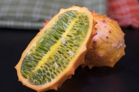Two Orange Kiwano Fruit On A Table Stock Photos