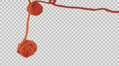 Two Orange Yarn Balls Threads Are Unraveling Alpha Channel Colorful Tangle of Stock Footage 61627649