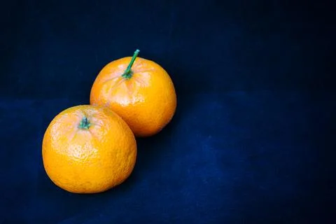 Two oranges on blue Foto stock