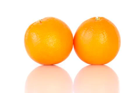 Two oranges isolated on white background. Stock Photos