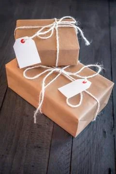 Two overlaid presents with labels Stock Photos