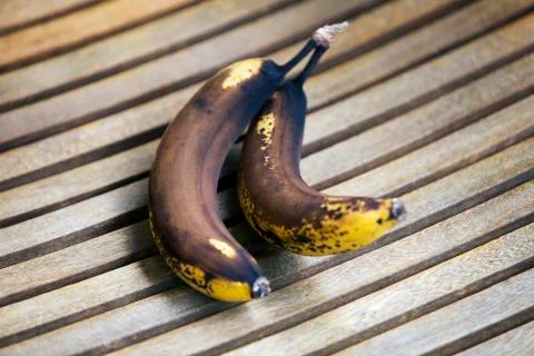 Two overripe bananas Stock Photos