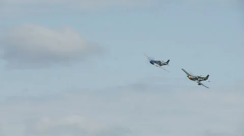 Two P-51 Mustangs Fly Past 30 1 Stock Footage 23157210