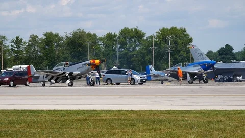 Two P-51 Mustangs warming up before a flight Stock Footage 114437522