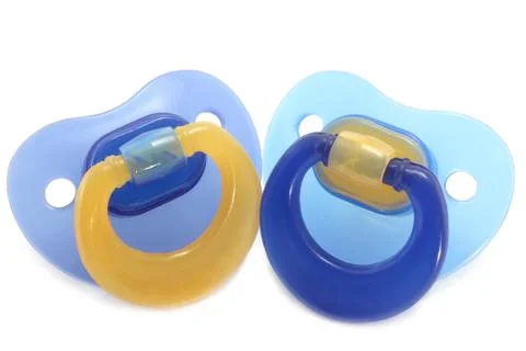 Two pacifiers close-up Stock Photos