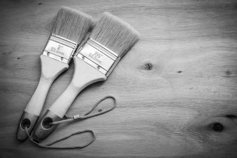 Two paint brushes, Views isolated on plywood, Backgrounds Stock Photos