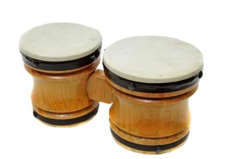 Two pair of miniature toy bongo drums isolated on white background. Stock Photos