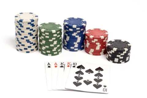 Two pair poker hand with colored poker chips. Stock Photos