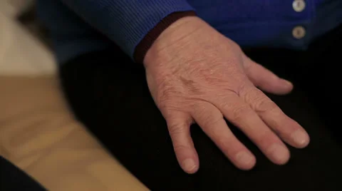 Two pairs of hand touch each other, together, helping hands Stock Footage 34277815