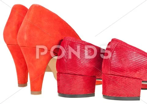 Two pairs heelpieces of red women's shoes Stock Photos