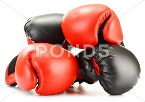 Two pairs of leather boxing gloves isolated on white Stock Photos