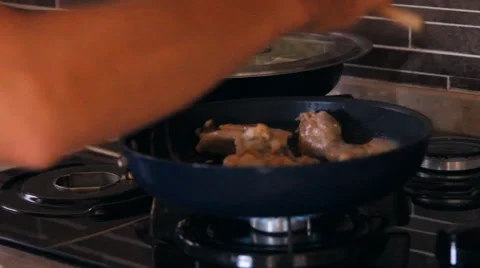 Two pan on the fire, chicken fried Stock Footage 40217325