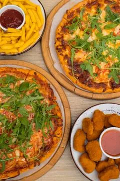 Two pan pizzas in two pizza boxes with their two different flavors Stock Photos