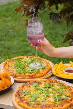 Two pan pizzas in two pizza boxes with their two different flavors Stock Photos