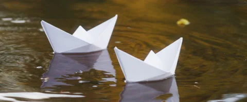 Two paper boats 2 Stock Footage 49697298