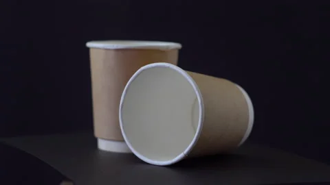 Two paper cups 4K Stock Footage 154516449