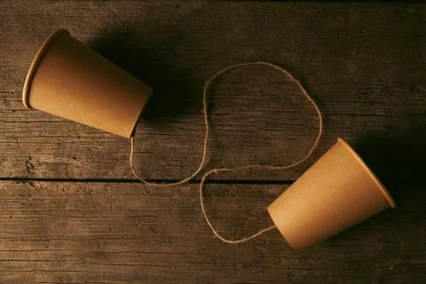 Two paper cups with thread Stock-Fotos