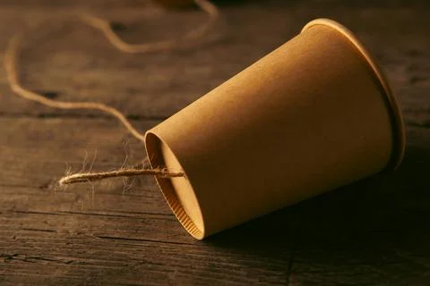 Two paper cups with thread Stock-Fotos
