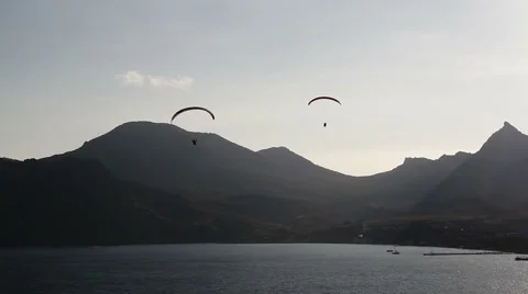 Two paraglider above the bay Stock Footage 68681998