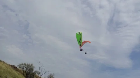 Two paraglider in the blue sky with clouds Stock Footage 73678870