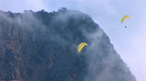Two paragliders flying Stock Footage 24170213