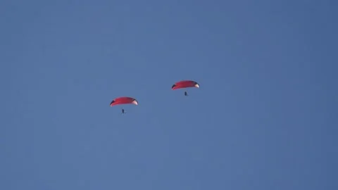 Two Paragliders Flying High in The Sky, Competitive Paragliding Stock-Footage 169498007