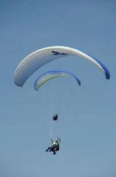 Two paragliders flying Stock Photos