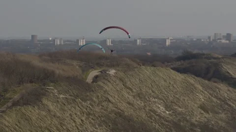 Two Paragliders Flying Side by Side Zoutelande Video stock 333488483