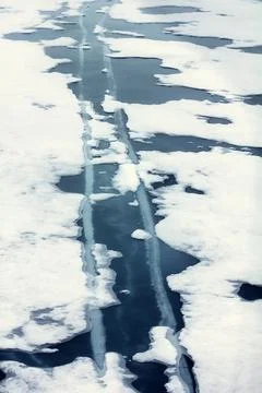 Two parallel cracks in an annual ice Stock Photos