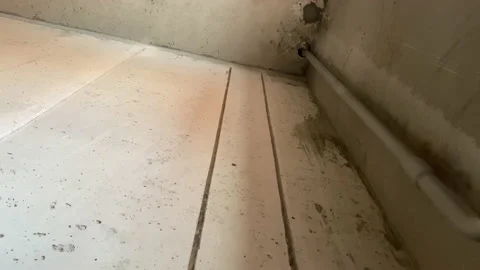 Two parallel ducts in cement wall chased for electric wires socket holes no Stock Footage 150175561