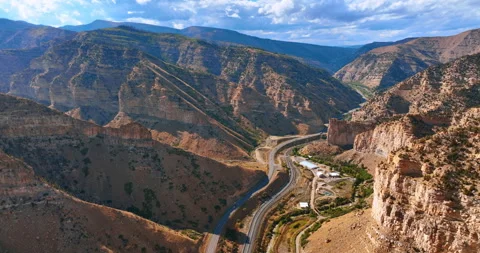 Two parallel motorways cross the rocky landscape. Stock Footage 318802737