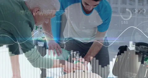 Two paramedics conducting CPR training with bag valve mask in medical room, Stock Footage 307441434