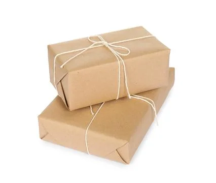 Two parcel boxes wrapped in paper isolated on white Stock Photos