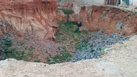 Two Partition Borrow Pit Refuse Dumping Site in Nigeria Vídeo Stock 321458445