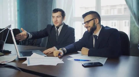 Two partners negotiating Stock Footage 68784252