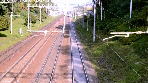 Two Passenger Trains At The Camera Top View In Daylight Stock Footage 84828111