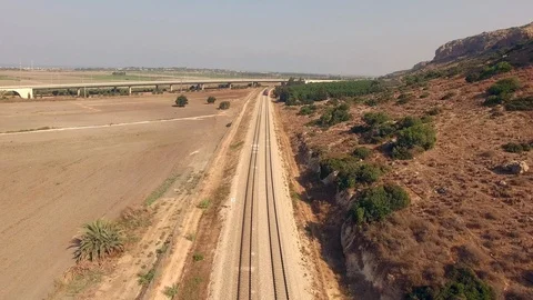 Two passenger trains passing by / pass by each other - aerial 4k view Stock Footage 111079966