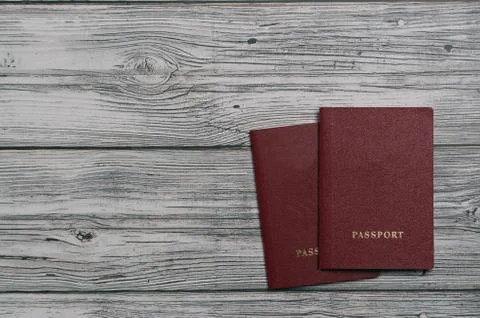 Two passports with on a wooden background for customs top view. place for tex Stock Photos