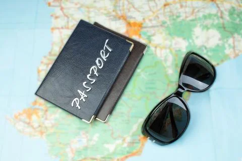 Two passports on the world map. The concept of tourism. Top view . Stock-Fotos